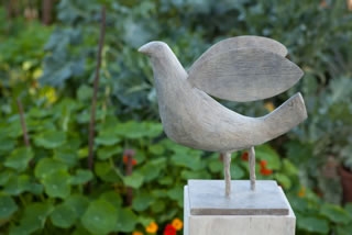 proud bird on plinth